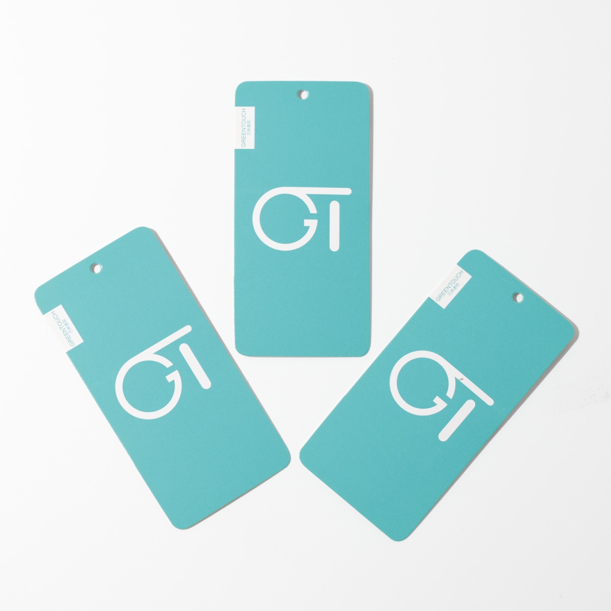 GREENTOUCH — teal apparel hang tags with white logo print and side seal label