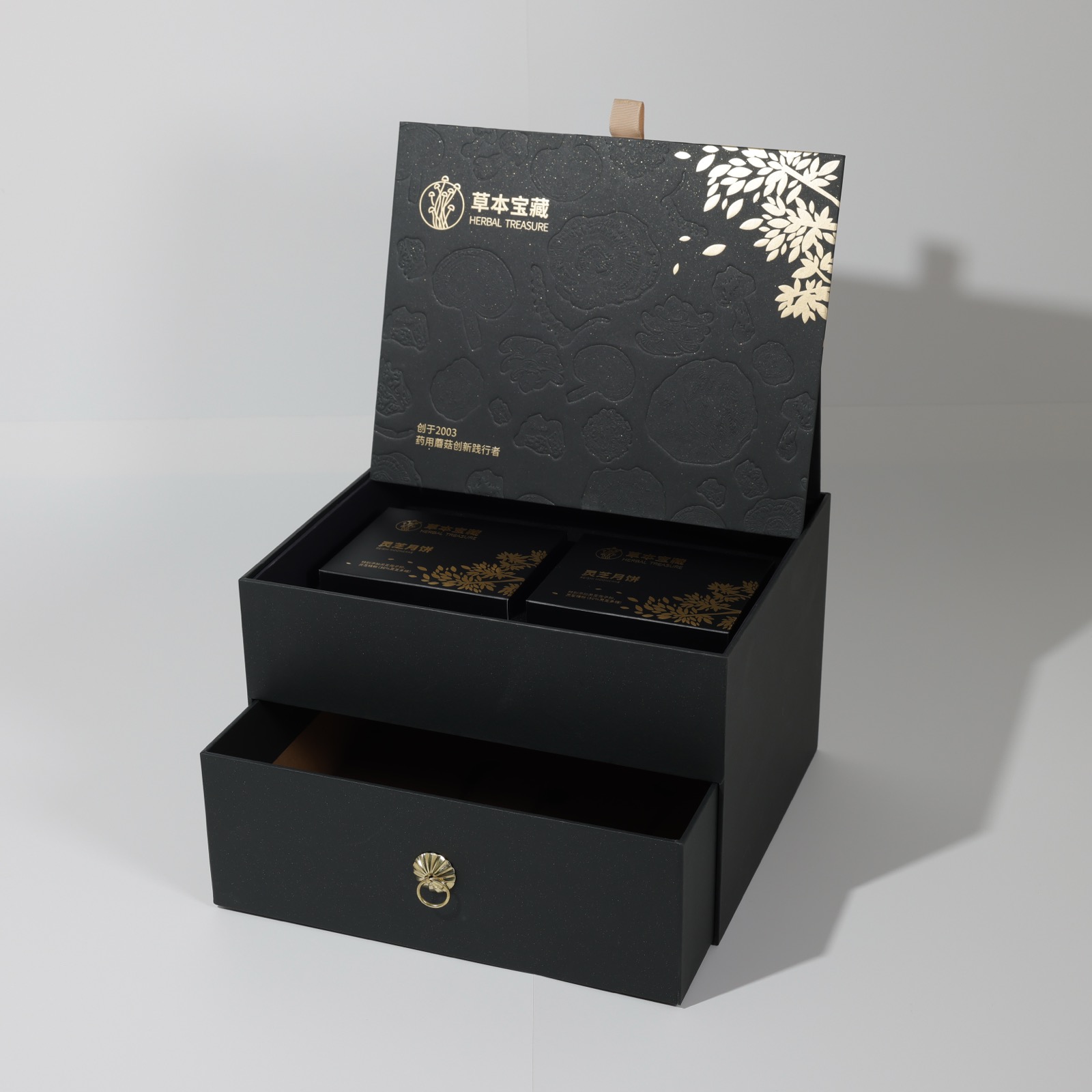 Herbal Treasure 草本宝藏 — black rigid drawer gift box with gold hot foil and blind-embossed mushroom artwork